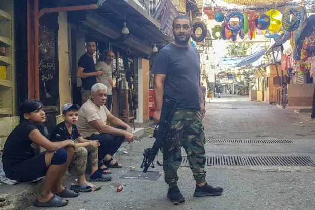 A member of the "Fatah" movement in Ain al-Hilweh camp during the clashes last July (AP)