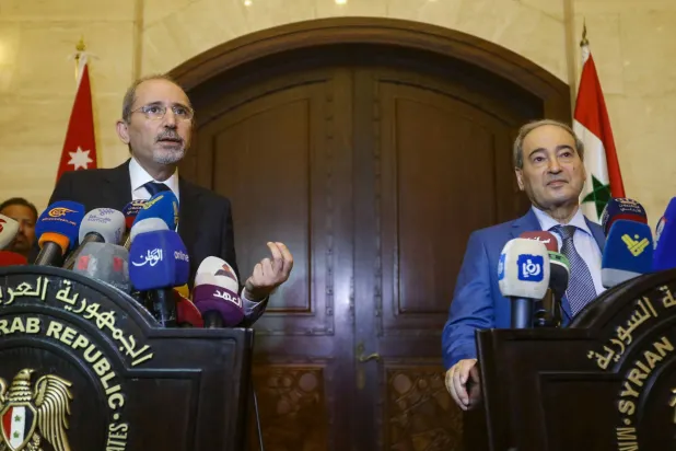 مؤتمر صحافي في دمشق لوزير الخارجية السوري فيصل المقداد ونظيره الأردني أيمن الصفدي 3 يوليو الماضي (أ.ف.ب)