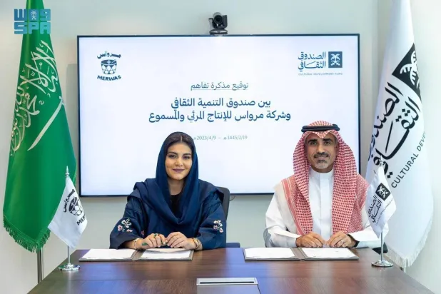 Mohammed Bin Dayel and Nada  Al-Tuwaijri during the signing of
the MoU at the Saudi Cultural Development Fund's headquarters, in Riyadh. (SPA)