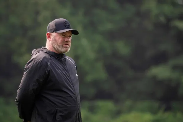 واين روني يأمل أن يحقق مع برمنغهام ما فشل في تحقيقه بتجاربه السابقة (ا ف ب)