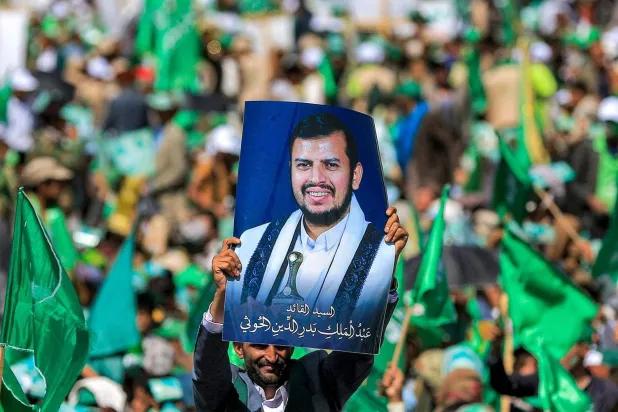 The Houthi group contradicts itself in speech and practice regarding the peace process (AFP)