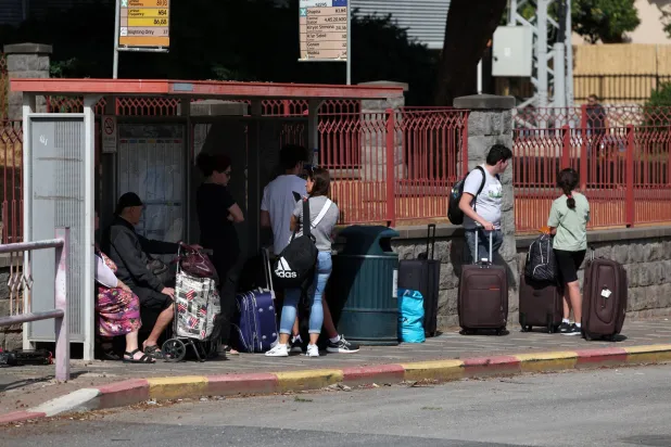 Israelis wait to be evacuated from their settlement opposite the Lebanese border. (EPA) 