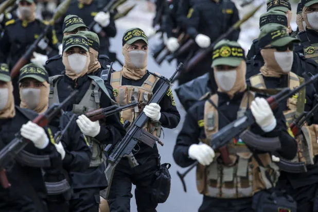 غزہ میں "القدس بریگیڈز" سے وابستہ جنگجوؤں کے ایک گروپ کی فائل فوٹو (ای پی اے)