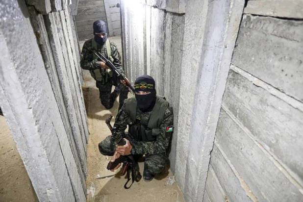 Islamic Jihad fighters guard a Gaza tunnel in March. (Getty Images)