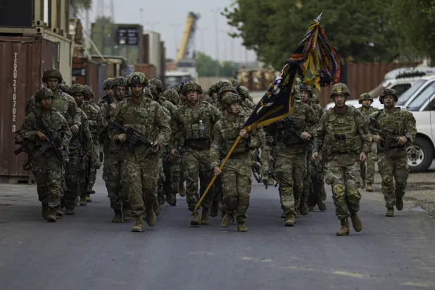 عدد من عناصر القوات الأميركية والتحالف الدولي على هامش حفل عسكري في بغداد 4 أكتوبر الماضي (الجيش الأميركي)