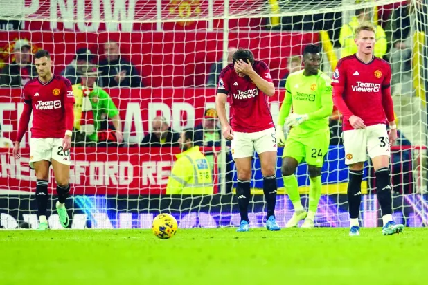 لاعبو مانشستر وهدف فودين الثالث ضمن ثلاثية مانشستر سيتي (أ.ب)