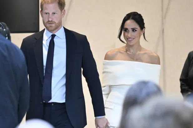 الأمير البريطاني هاري وزوجته ميغان ماركل (أ.ب)