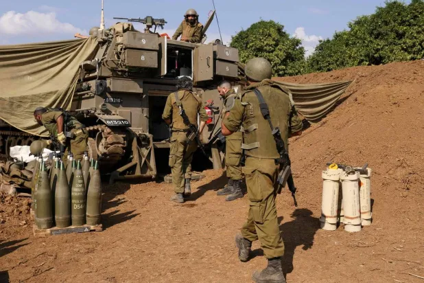 Israeli soldiers from the artillery unit at a location near the border with Lebanon (AFP)