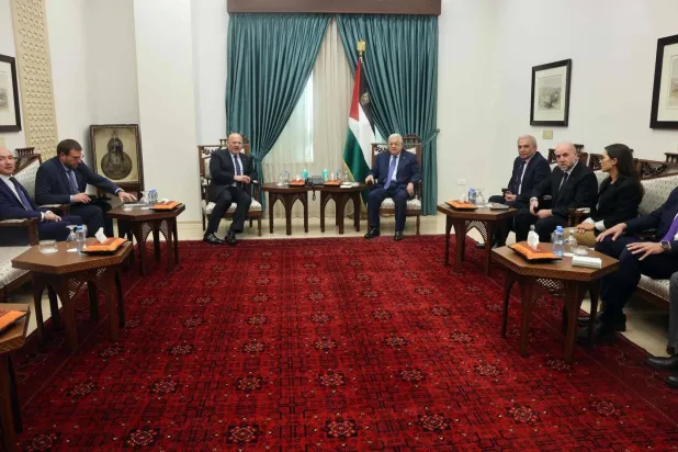 Palestinian President Mahmoud Abbas with the Prosecutor of the International Criminal Court, Karim Khan, in Ramallah in the West Bank (AFP)