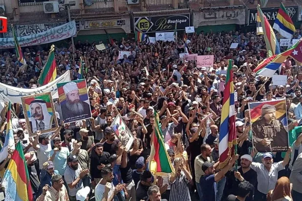 Anti-regime protests are held in Sweida in August. (Reuters)
