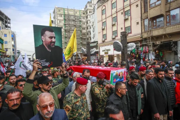 People attended the funeral of a high-ranking Iranian general,Razi Mousavi, in Najaf, Iraq, on Wednesday, Dec. 27, 2023. AP