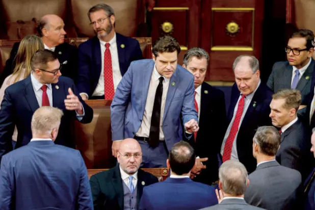 النائب مات غيتز يخاطب زملاءه في مجلس النواب الأربعاء (أ.ف.ب)