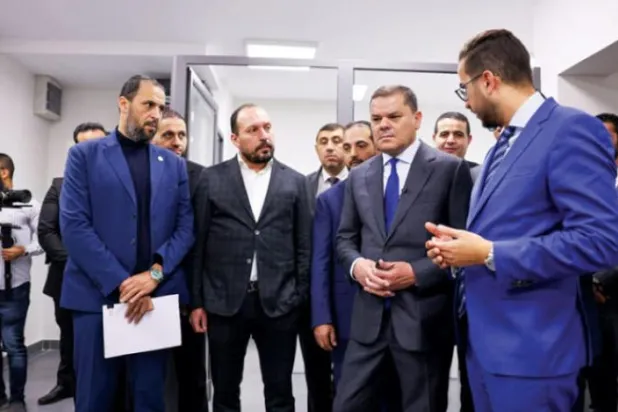 Interim Libyan Prime Minister Abdul Hamid Dbeibeh attends the opening of a government services office in Tripoli. (Photo: Unity Government)

