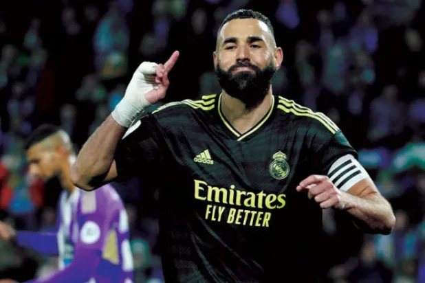 بنزيمة يعود لتدعيم هجوم ريال مدريد (أ.ف.ب)