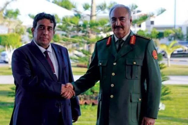 المنفي رئيس المجلس الرئاسي الليبي وحفتر القائد العام للجيش الوطني (أرشيفية - القيادة العامة)