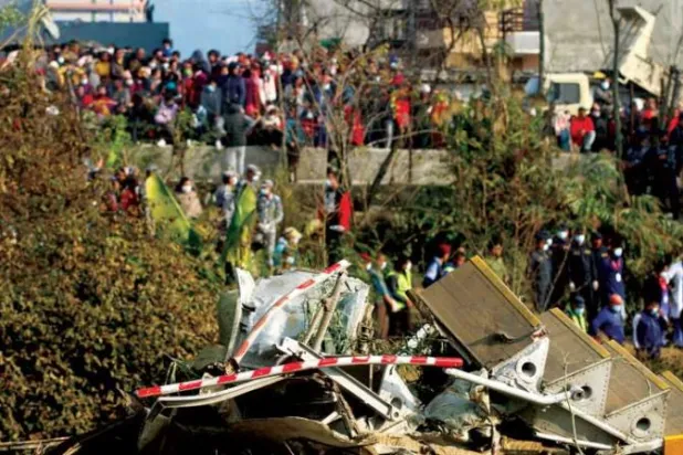 ركام الطائرة النيبالية التي سقطت أمس (إ.ب.أ)