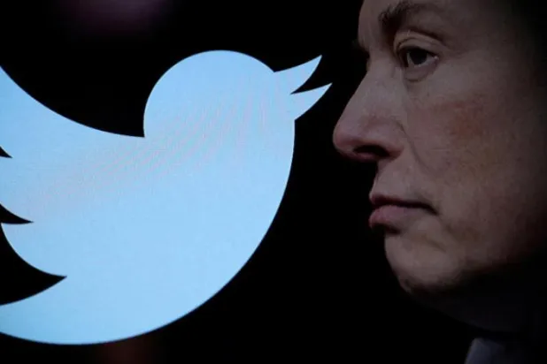 Twitter logosunun yanında Elon Musk'ın fotoğrafı (Reuters)