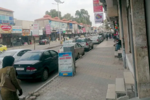 حركة خفيفة في سوق الشهداء بمدينة درعا المحطة (الشرق الأوسط)