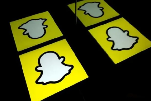 شعار شركة سناب المطورة لتطبيق التواصل الاجتماعي (أ.ف.ب)