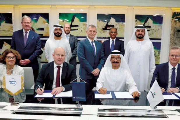جانب من توقيع الاتفاقية في الإمارات أمس (وام)
