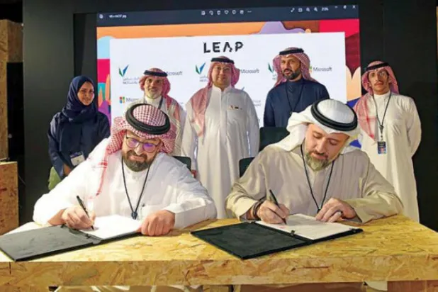 Officials sign a tripartite agreement to form an advisory council for sustainable economic transformations, during the LEAP conference on Tuesday. (SPA)