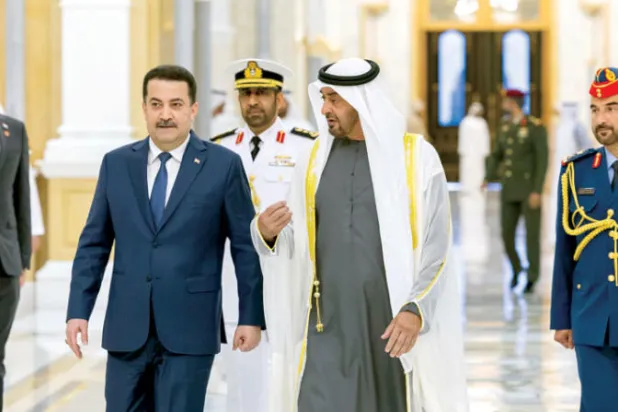 الشيخ محمد بن زايد خلال استقباله محمد السوداني في أبوظبي أمس (وام)