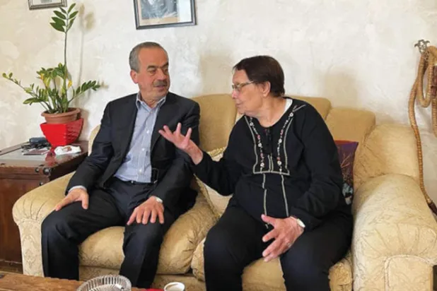 Leila Khaled (R) and the Editor-in-chief of Asharq Al-Awsat Newspaper Ghassan Charbel (L) - AAWSAT