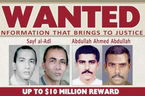 سيف العدل (الأول من اليسار) على موقع «مكافأة من أجل العدالة»