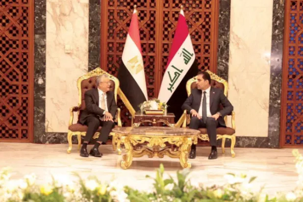 المندلاوي مستقبلاً جبالي في بغداد أمس (واع)