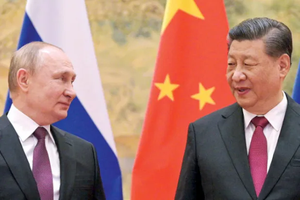 الرئيسان الصيني تشي جيبينغ والروسي فلاديمر بوتين في لقاء فبراير 2020 (أ.ب)