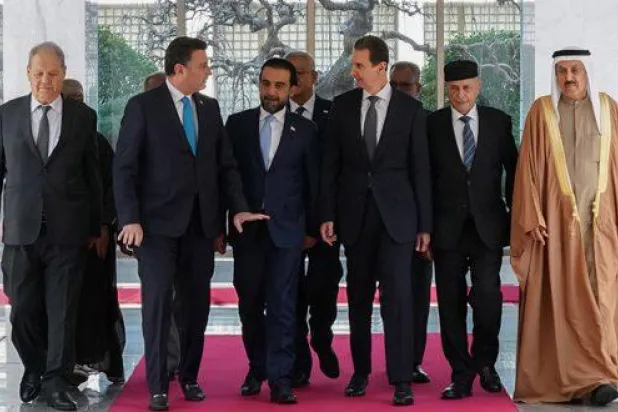 الرئيس السوري بشار الأسد مع وفد الاتحاد البرلماني العربي اليوم في دمشق (سانا)