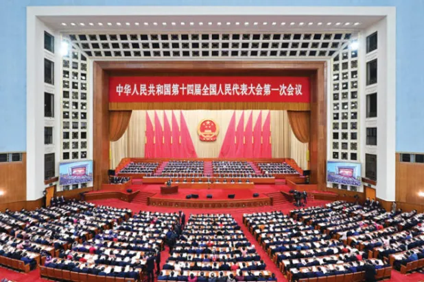 جانب من افتتاح الجلسة البرلمانية في بكين أمس (إ.ب.أ)