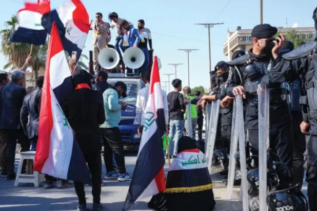 27 فروری کو انتخابی قانون میں ترمیم کے مسودے کے خلاف بغداد میں احتجاج کا منظر  (اے پی)