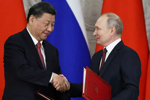 بوتين ينفي تشكيل «تحالف عسكري» مع الصين