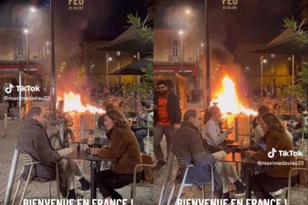 Fransa'da alevlerin arasında sakince şarap yudumlayanların görüntüsü viral oldu