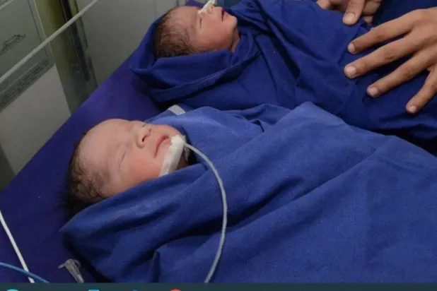 أطفال توأم (أرشيفية - أ.ف.ب)