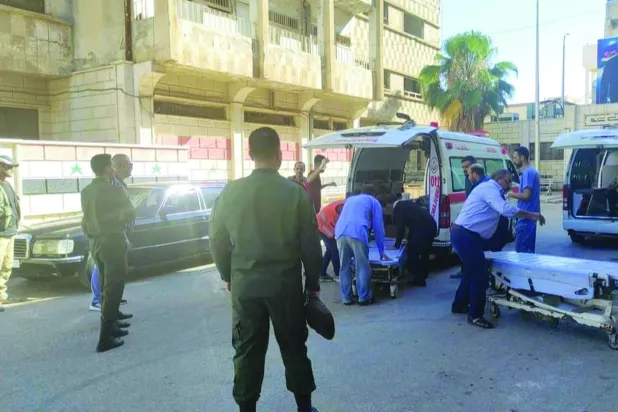 نقل جثامين شرطيين إلى مشفى درعا بعد عملية اغتيال طالتهما يونيو الماضي (مواقع)