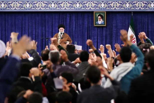 A picture published by Iranian Supreme Leader Ali Khamenei’s website showing him receiving a group of residents from the city of Qom.
