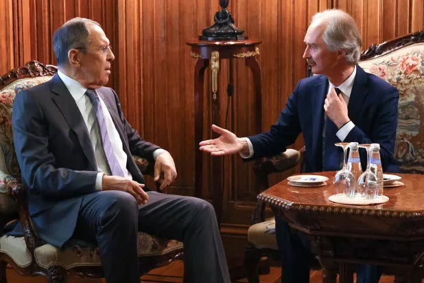 Russian Foreign Ministry Sergey Lavrov and UN envoy to Syria Geir Pedersen (AFP)