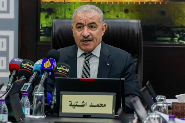 Palestinian Prime Minister Mohammad Shtayyeh during a government meeting in Ramallah (AFP)