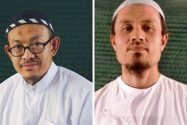 محمد فريق بن أمين (48 عاماً) «يسار» ومحمد نذير بن لاب (47 عاماً) (نيويورك تايمز)