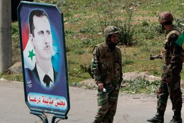 أرشيفية لقوات أمنية عسكرية في درعا (المرصد السوري)