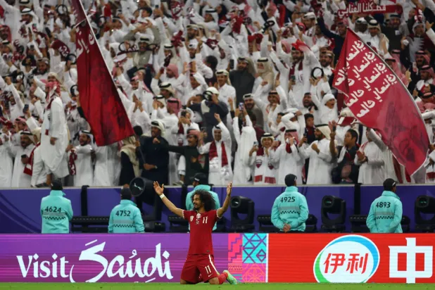 أكرم عفيف قاد قطر للقب الثاني على التوالي (رويترز)