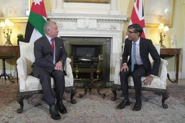 British Prime Minister Rishi Sunak and Jordan’s King Abdullah II pose for the media, at the start of their meeting inside 10 Downing Street, in London. (Reuters)