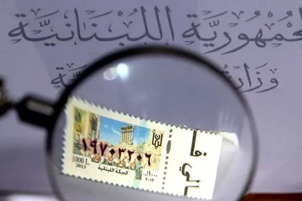 فقدان الطوابع يؤدي إلى تعطيل المعاملات في الدوائر الرسمية (الصوة من الوكالة الوطنية للإعلام)