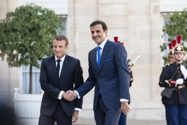 Emir of Qatar Sheikh Tamim bin Hamad Al Thani meets with French President Emmanuel Macron in Paris in 2019. (Qatar’s Amiri Diwan) 