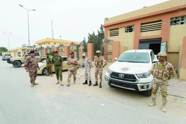UBH’ye bağlı güçler, Zaviye kentinin çeşitli mahallelerinde sıkı güvenlik önlemleri aldı (Arşiv - AFP)
