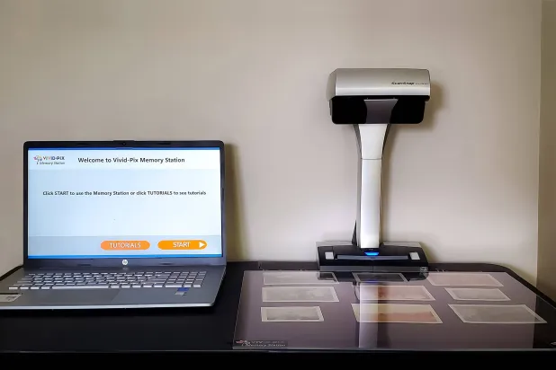 جهاز لرقمنة صورالعائلة القديمة