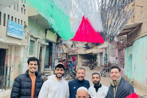 عدد من شباب قرية أتميدة بدلتا مصر (الشرق الأوسط)