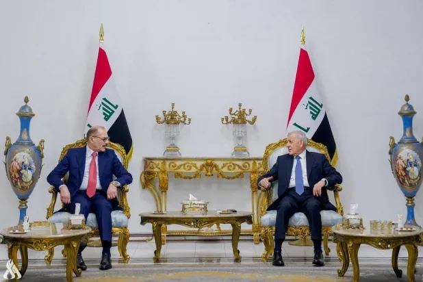 الرئيس العراقي (يمين) ورئيس المحكمة الاتحادية العليا (الأحد) في بغداد (الموقع الرسمي للمحكمة)